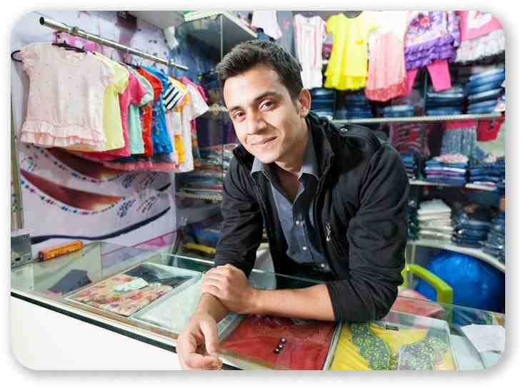Why do businesses choose to buy from a wholesaler?